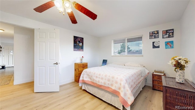 bedroom featuring light hardwood / wood-style flooring and ceiling fan