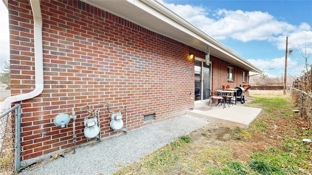 view of home's exterior featuring a patio area