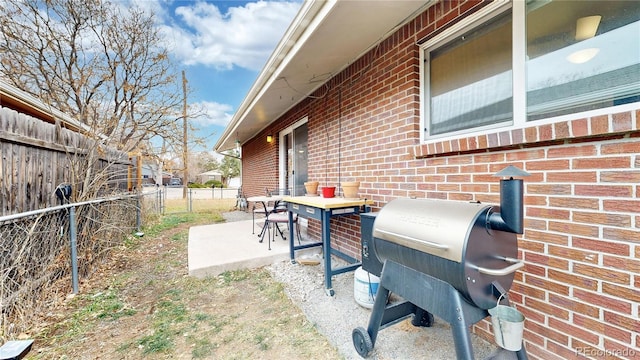 view of patio / terrace featuring a grill