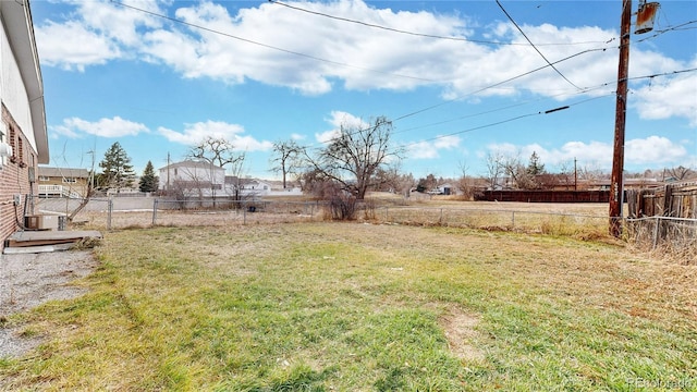 view of yard with central AC