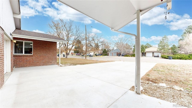 view of patio with a garage