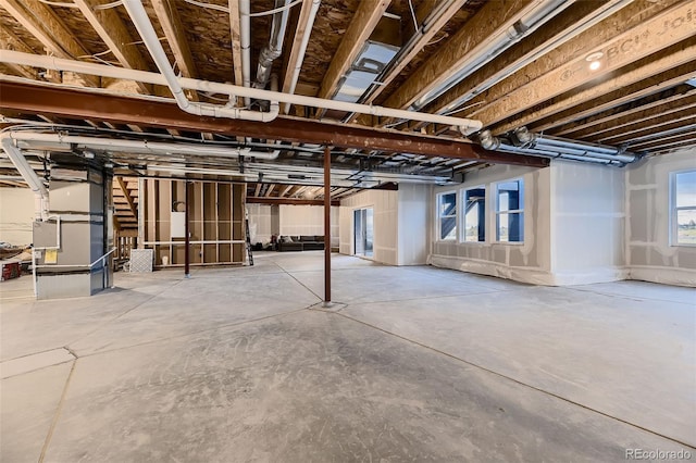 8868 Geyser Peak Way, Parker, CO 80138 - basement featuring heating unit and stairway