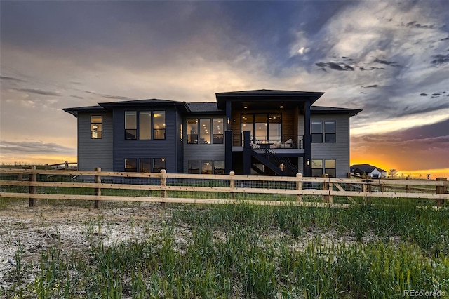 8868 Geyser Peak Way, Parker, CO 80138 - rear view of property featuring a fenced backyard and stairs