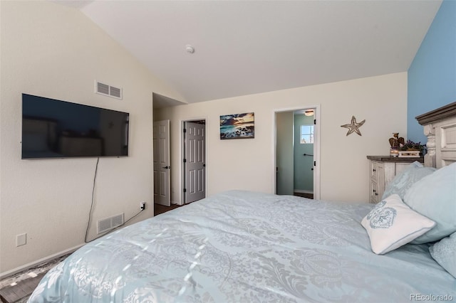 bedroom featuring vaulted ceiling