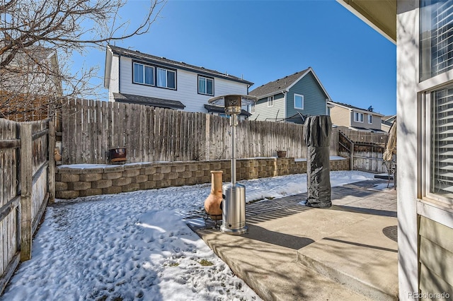 view of snow covered patio