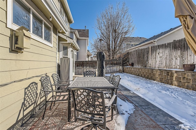 view of snow covered patio