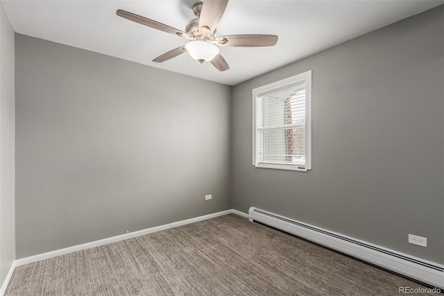 spare room featuring carpet flooring, baseboard heating, and ceiling fan