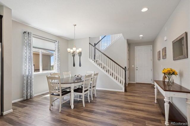 16268 Mount Silverheels Way, Broomfield, CO 80023 - dining room with dark wood-style flooring, a chandelier, healthy amount of natural light, baseboards, and recessed lighting