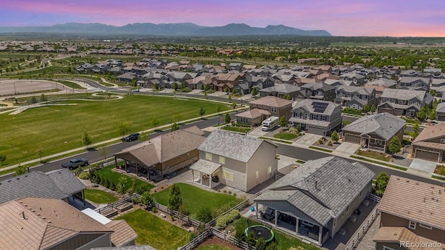 16268 Mount Silverheels Way, Broomfield, CO 80023 - aerial view at dusk of a mountain view and a residential view