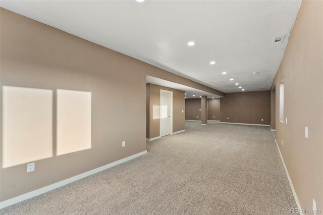 basement featuring carpet floors