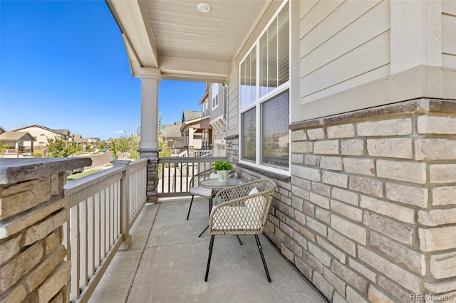 balcony featuring a residential view