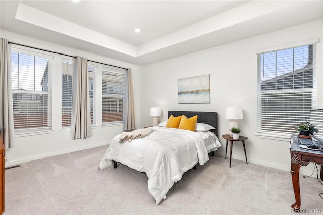 bedroom featuring baseboards, multiple windows, carpet, and visible vents