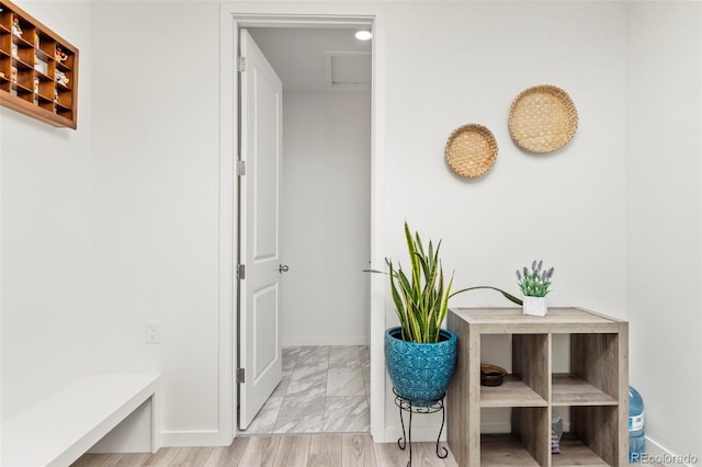interior space featuring baseboards