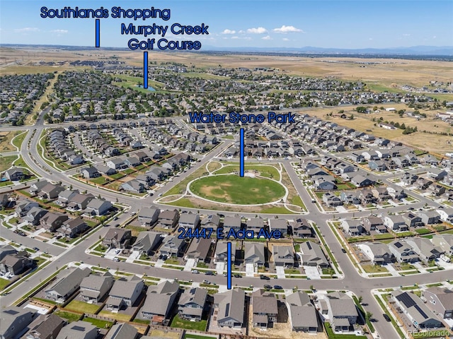birds eye view of property with a residential view