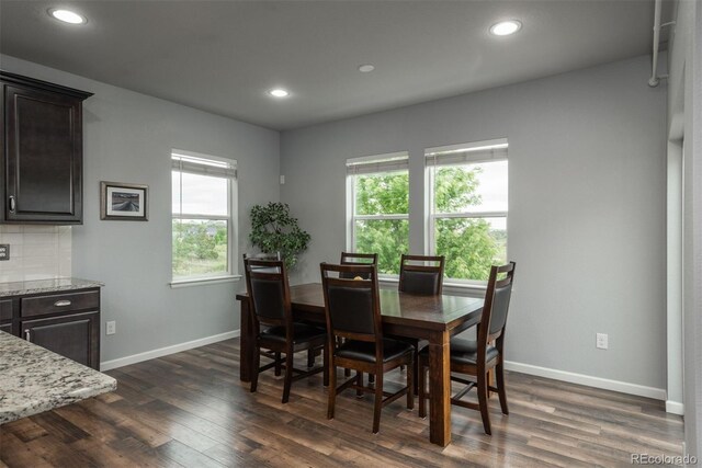 4025 Trail Stone Cir, Castle Rock, CO 80108 - dining space featuring healthy amount of natural light, dark wood finished floors, and recessed lighting