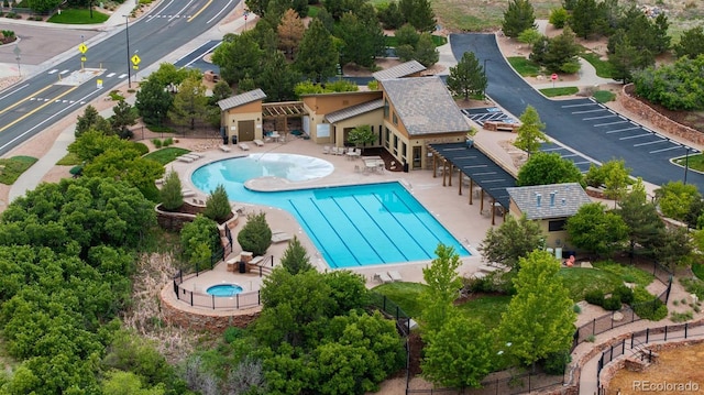 4025 Trail Stone Cir, Castle Rock, CO 80108 - community pool with a patio