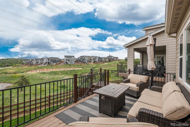 4025 Trail Stone Cir, Castle Rock, CO 80108 - wooden terrace featuring outdoor lounge area and a residential view