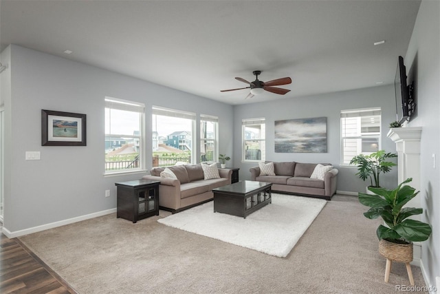 4025 Trail Stone Cir, Castle Rock, CO 80108 - living area with plenty of natural light, ceiling fan, and carpet flooring