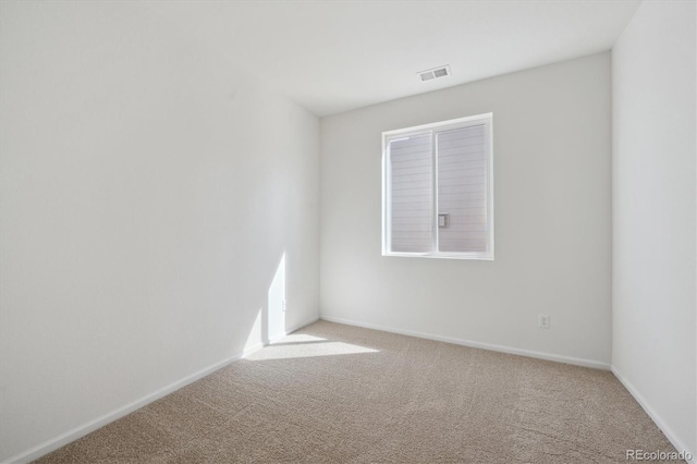 1306 Sienna Peak Cir, Erie, CO 80516 - carpeted spare room featuring baseboards and visible vents