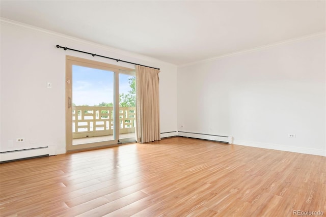 695 S Alton Way Unit 9C, Denver, CO 80247 - spare room with a baseboard radiator, ornamental molding, and light wood finished floors