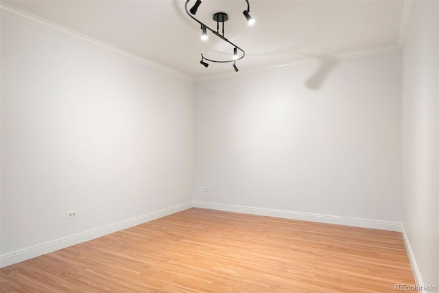 695 S Alton Way Unit 9C, Denver, CO 80247 - unfurnished dining area featuring ornamental molding and light wood-style floors