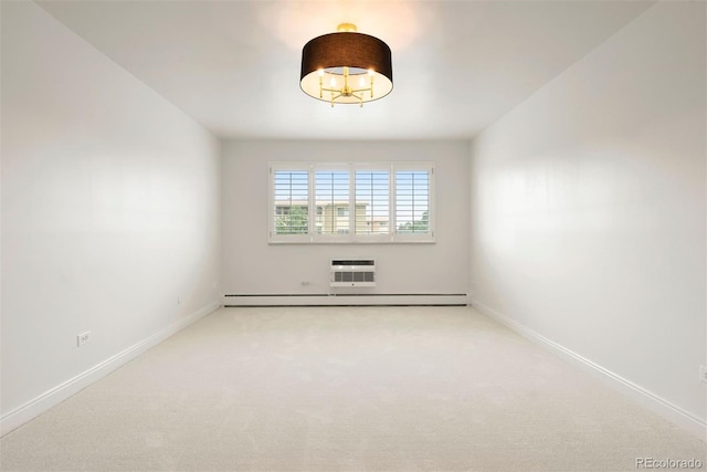 695 S Alton Way Unit 9C, Denver, CO 80247 - unfurnished room featuring baseboard heating and light colored carpet