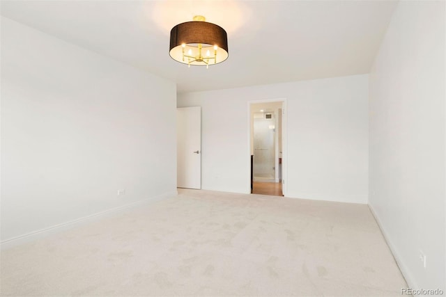 695 S Alton Way Unit 9C, Denver, CO 80247 - empty room with carpet floors and baseboards