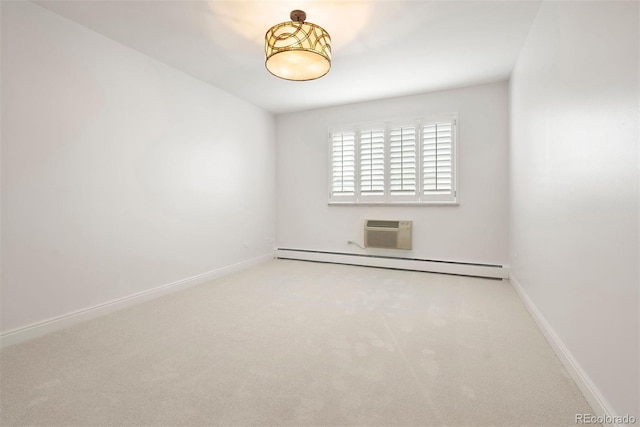 695 S Alton Way Unit 9C, Denver, CO 80247 - unfurnished room with baseboard heating, carpet, and a wall mounted air conditioner
