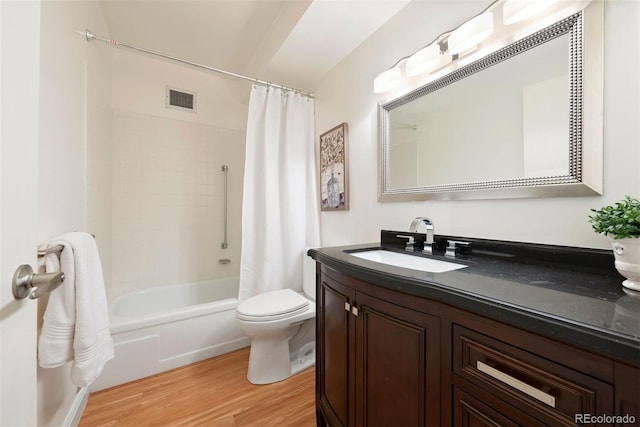 695 S Alton Way Unit 9C, Denver, CO 80247 - bathroom with vanity, wood finished floors, and shower / bathtub combination with curtain