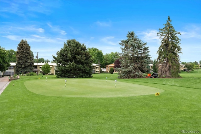 695 S Alton Way Unit 9C, Denver, CO 80247 - view of community with a putting area, golf course view, and a yard