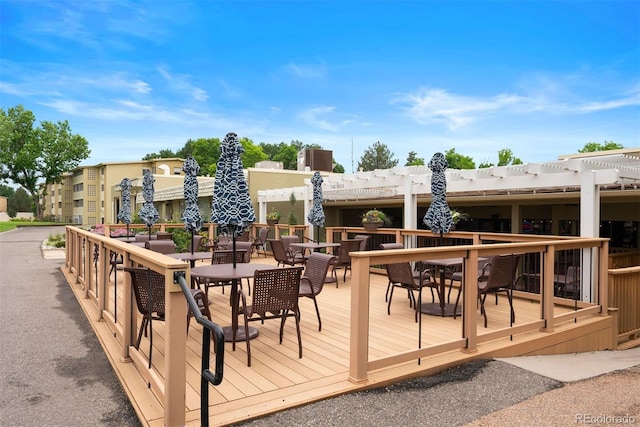 695 S Alton Way Unit 9C, Denver, CO 80247 - wooden terrace featuring outdoor dining space