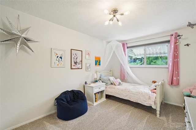 841 Beech St, Golden, CO 80401 - carpeted bedroom with a chandelier and a textured ceiling