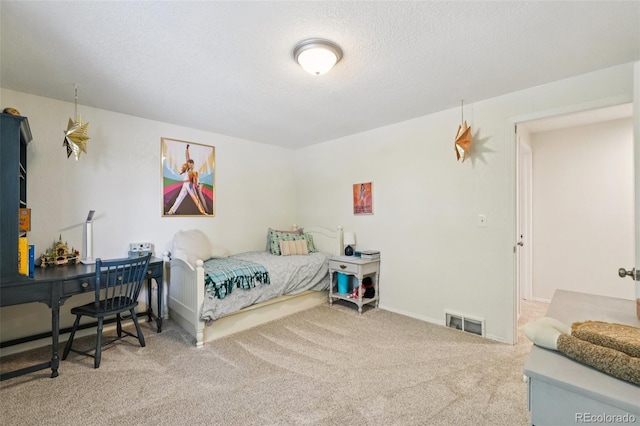 841 Beech St, Golden, CO 80401 - carpeted bedroom with a textured ceiling and baseboards