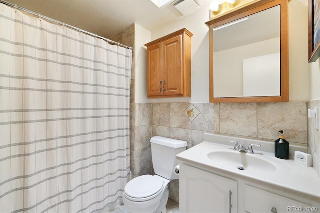 841 Beech St, Golden, CO 80401 - full bath with tile walls, vanity, and a shower with shower curtain