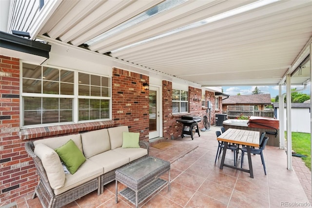 841 Beech St, Golden, CO 80401 - view of patio with a grill, outdoor lounge area, outdoor dining space, and a hot tub