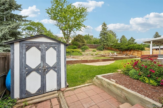 841 Beech St, Golden, CO 80401 - view of shed featuring a garden and a fenced backyard