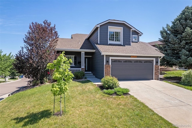 3357 Holly Hock Ct, Castle Rock, CO 80109 - craftsman-style house with a front lawn, covered porch, driveway, an attached garage, and roof with shingles