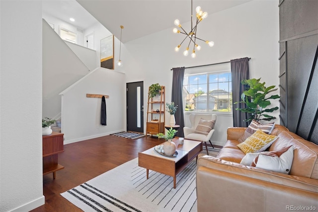 3357 Holly Hock Ct, Castle Rock, CO 80109 - living room featuring high vaulted ceiling, wood finished floors, a chandelier, and stairway