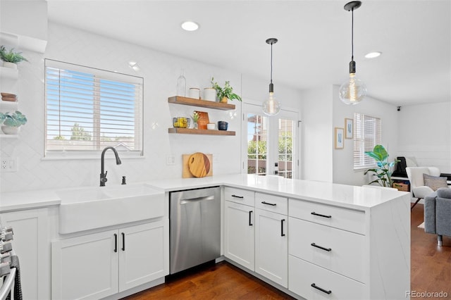 3357 Holly Hock Ct, Castle Rock, CO 80109 - kitchen featuring stainless steel dishwasher, open shelves, a peninsula, open floor plan, and dark wood-style floors