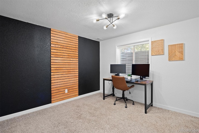 3357 Holly Hock Ct, Castle Rock, CO 80109 - home office with a chandelier, carpet flooring, a textured ceiling, and a textured wall