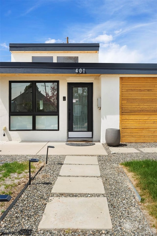 401 S Ivy St, Denver, CO 80224 - property entrance with stucco siding