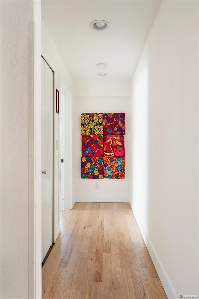 401 S Ivy St, Denver, CO 80224 - hall with light wood-type flooring and baseboards