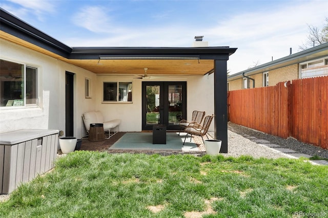 401 S Ivy St, Denver, CO 80224 - back of property featuring french doors, stucco siding, ceiling fan, and a patio area