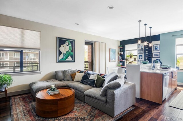 3420 W 32nd Ave Unit 203, Denver, CO 80211 - living room featuring dark wood-style flooring