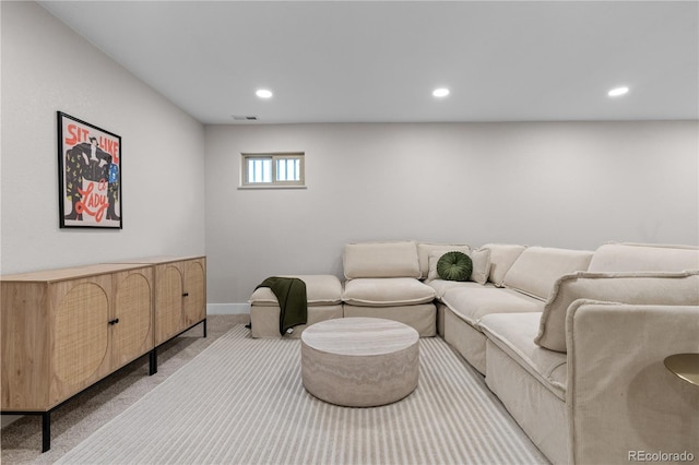 living area with visible vents, recessed lighting, carpet, and baseboards