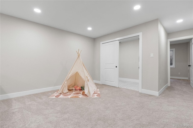 recreation room featuring carpet floors, recessed lighting, and baseboards