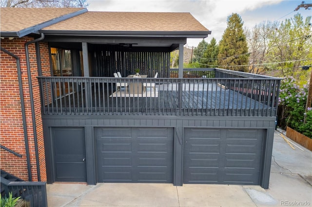 exterior space featuring a garage and concrete driveway