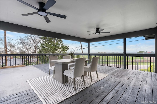 deck with ceiling fan and outdoor dining space
