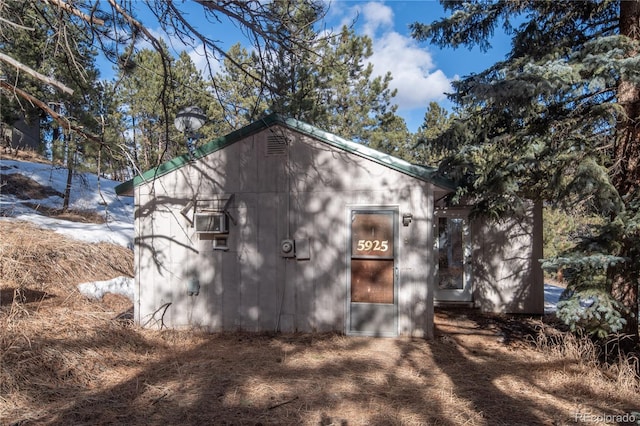 view of outbuilding with cooling unit