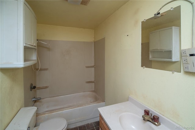 full bathroom featuring shower / tub combination, vanity, toilet, and tile patterned floors